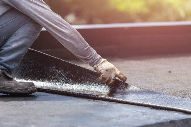 Professional Exterior Waterproofing technician working in Charlotte, MI